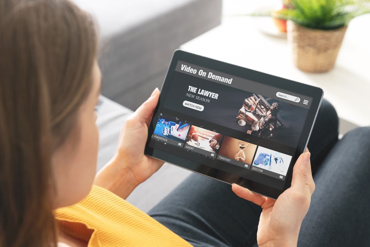 The photo shows a woman subscribing to streams.
