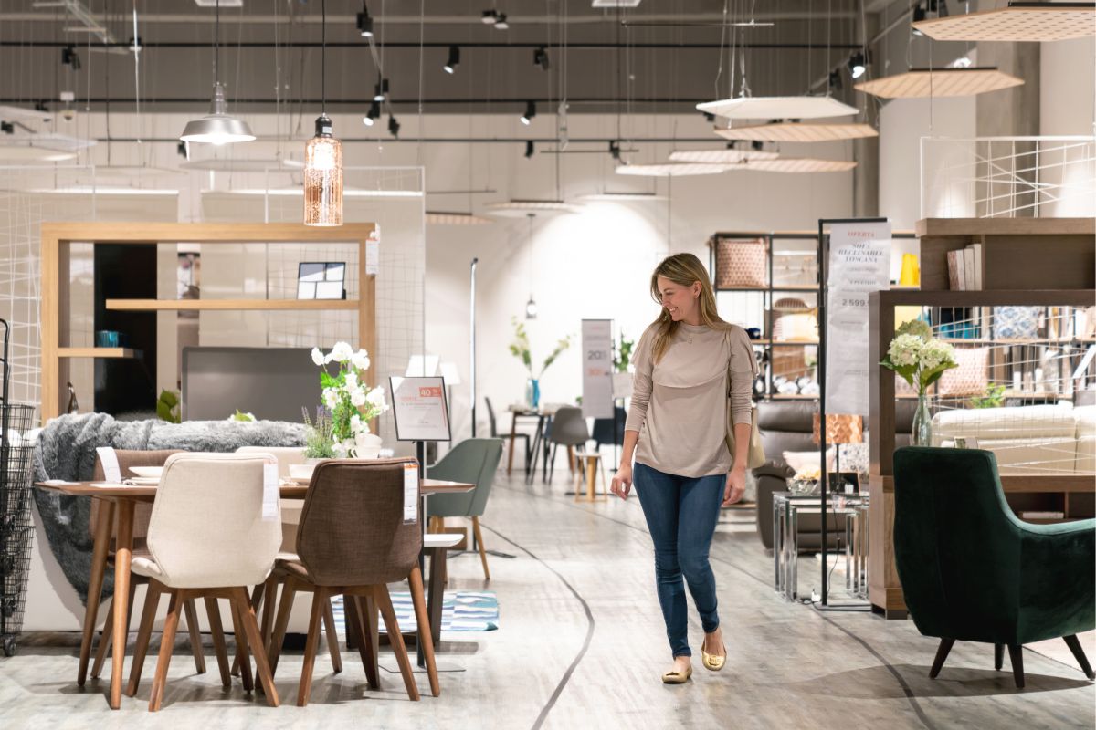 Picture of a woman shopping for furniture.