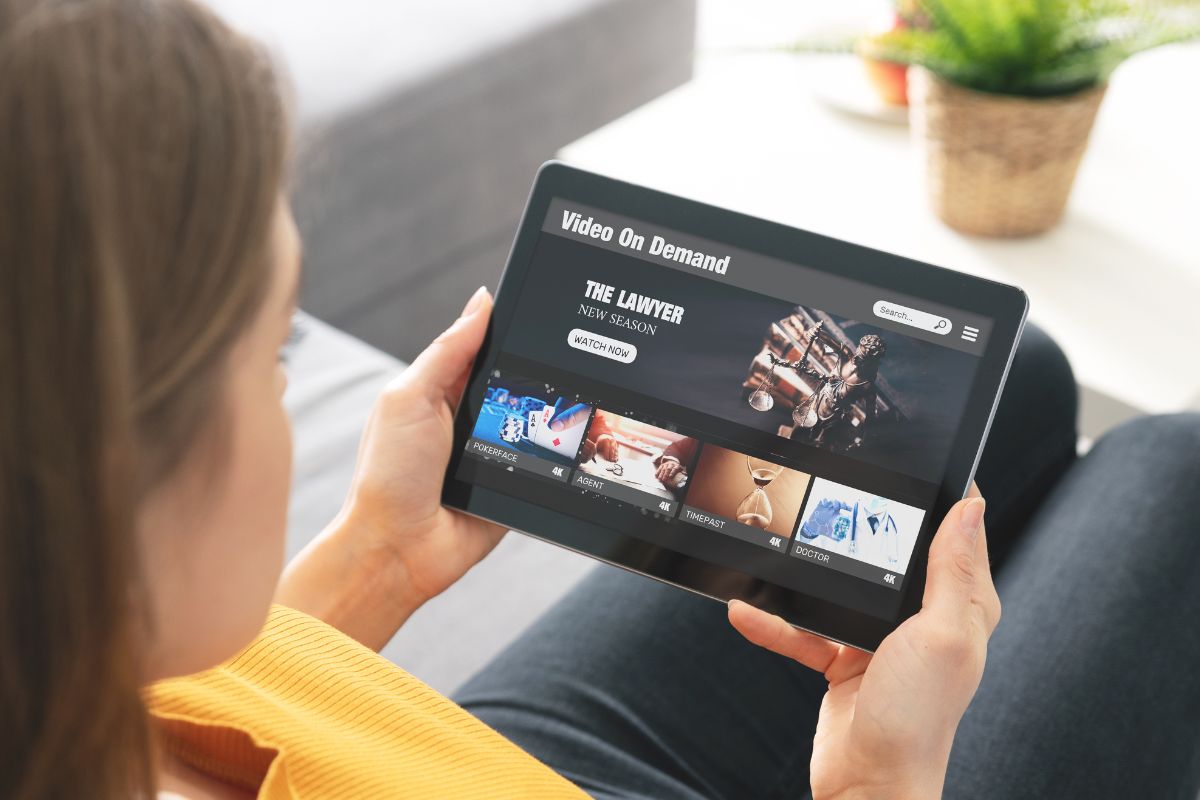 A woman using a tablet device.