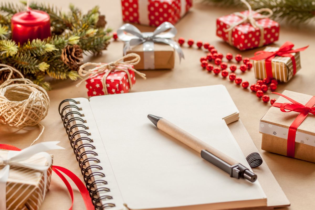 The image shows a notebook and pen.