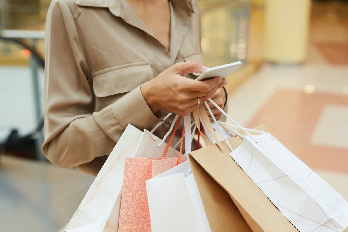The image shows a woman shopping.