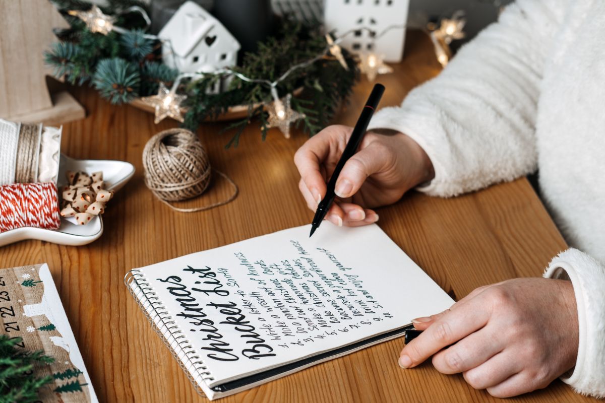 Photo of a woman creating bucket lists.