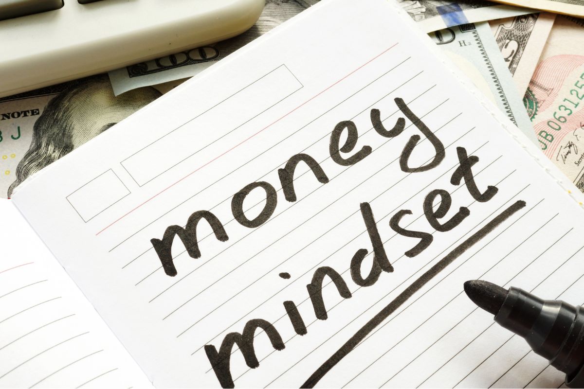 Photo of a notebook with money mindset wording.