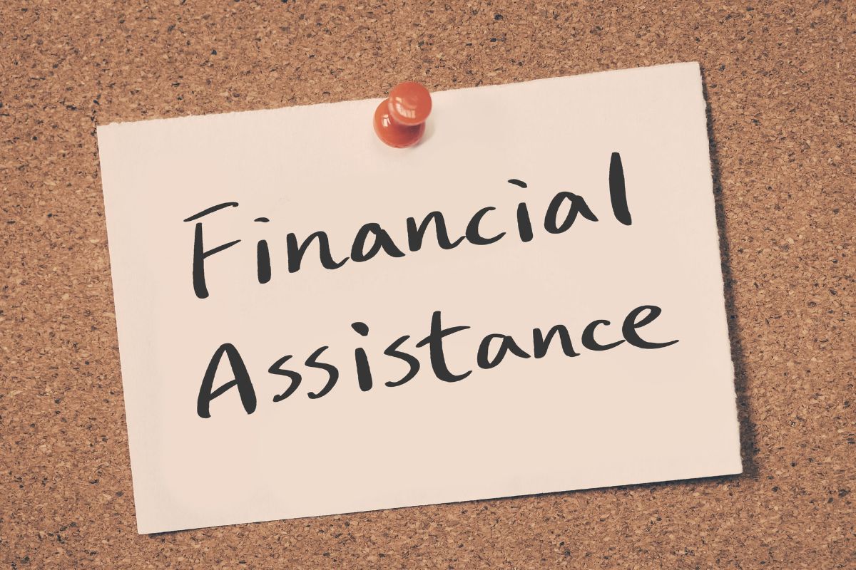 Image of a paper with financial assistance wording.