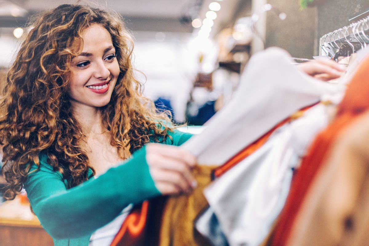 A woman shopping for clothes.