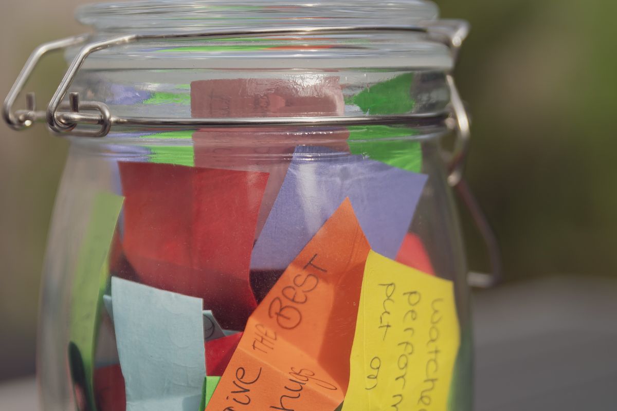 Photo of a jar with notes.