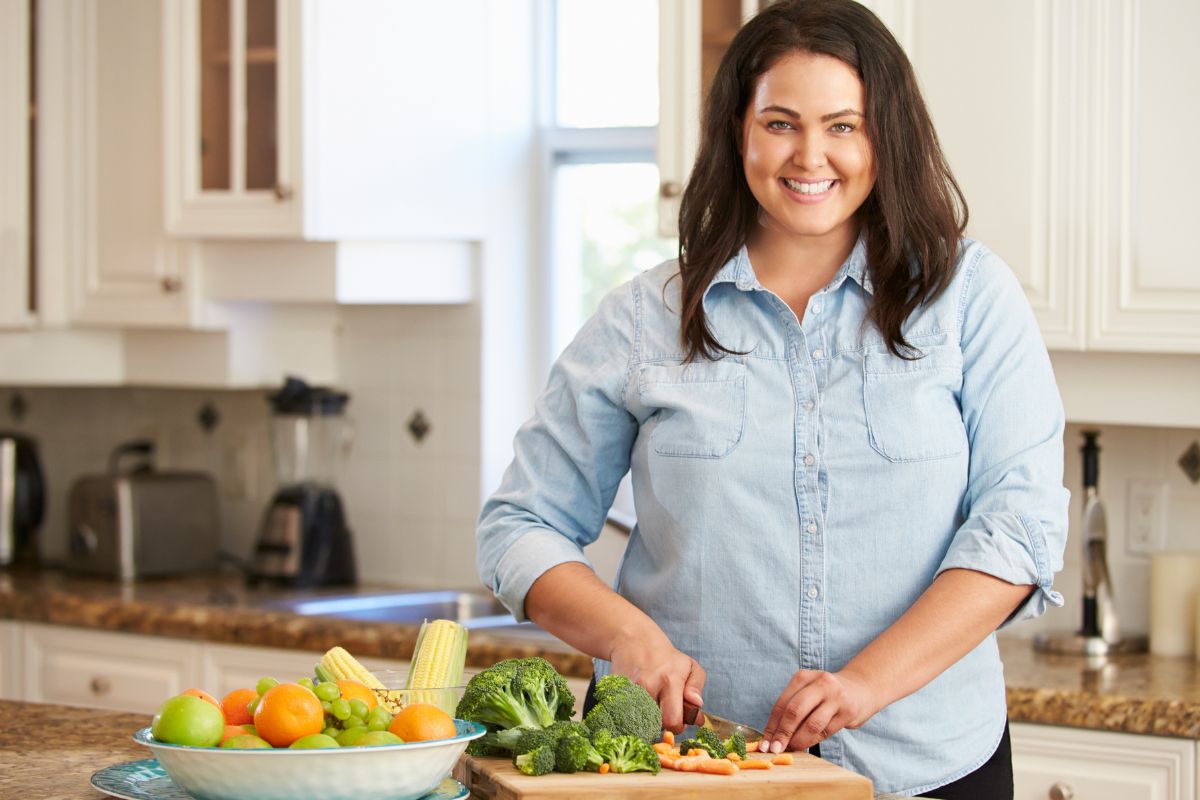 Image of a woman cooking a meal.