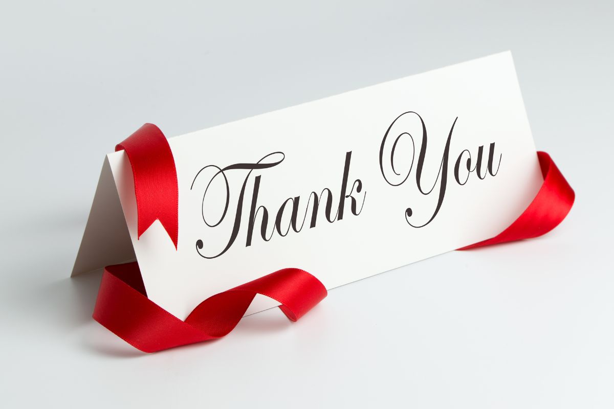 Photo of a paper with thank your wording.