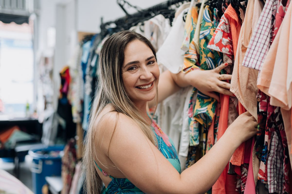 Picture of a woman shopping for clothes.