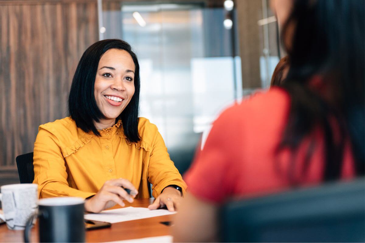 The photo tells about a financial advisor and client having their conversation together which means to seek professional financial advice to get back on track that can provide expert guidance and create a strategy tailored to your needs.