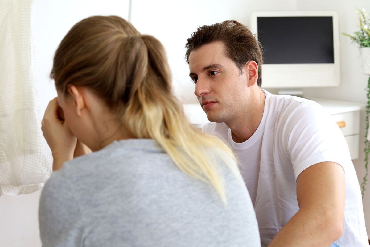 The picture of a girl looking sad and a man comforting her which means to use "I" statements to express feelings can keep things calm and less aggressive.