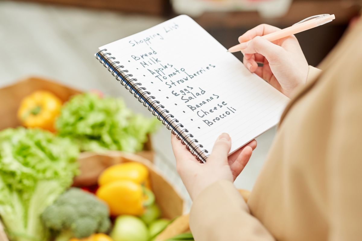 A woman's checking her shopping list.
