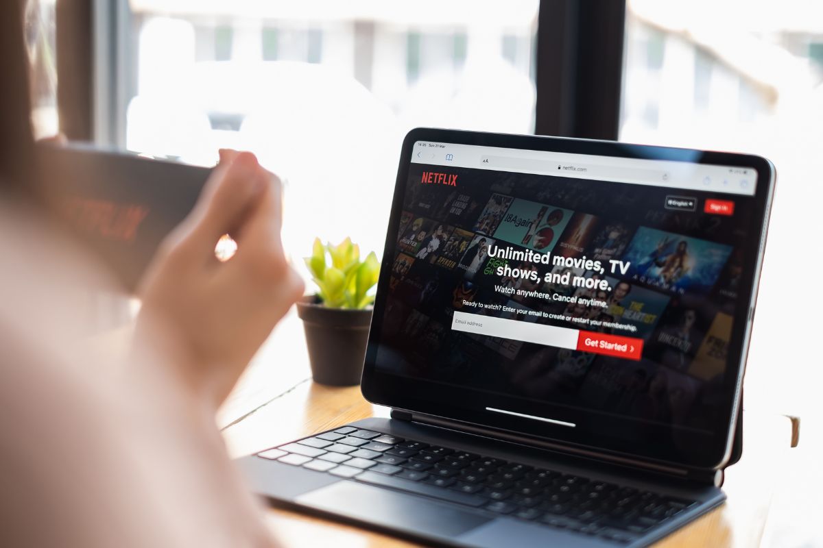 Image of a woman using a subscription service.
