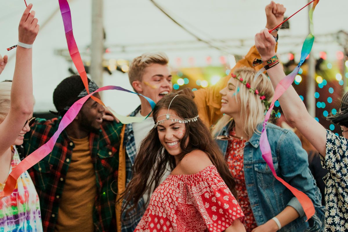 The image shows a group of people partying.