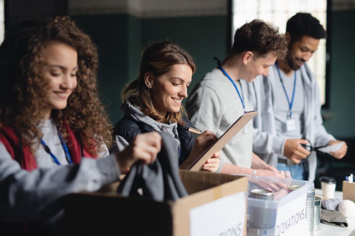 The picture shows people building a donation group.