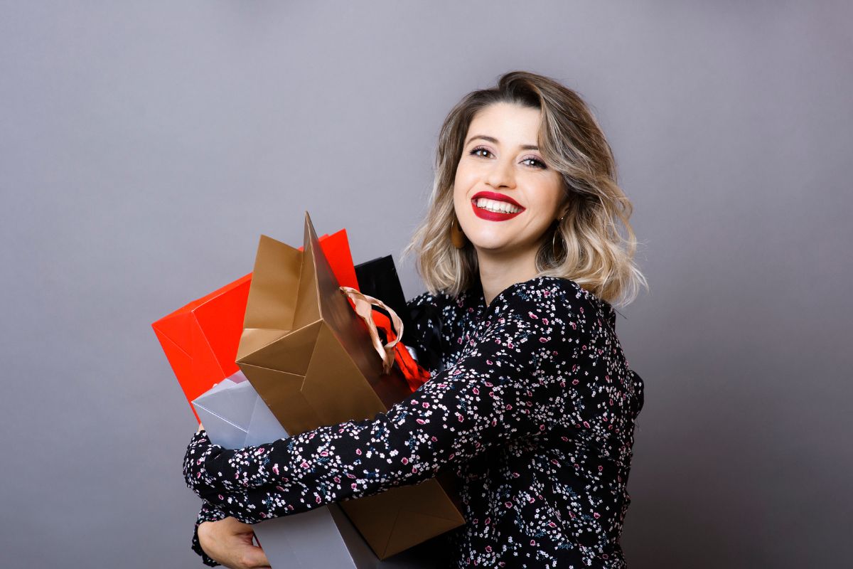 Picture of a woman with shopping bags.
