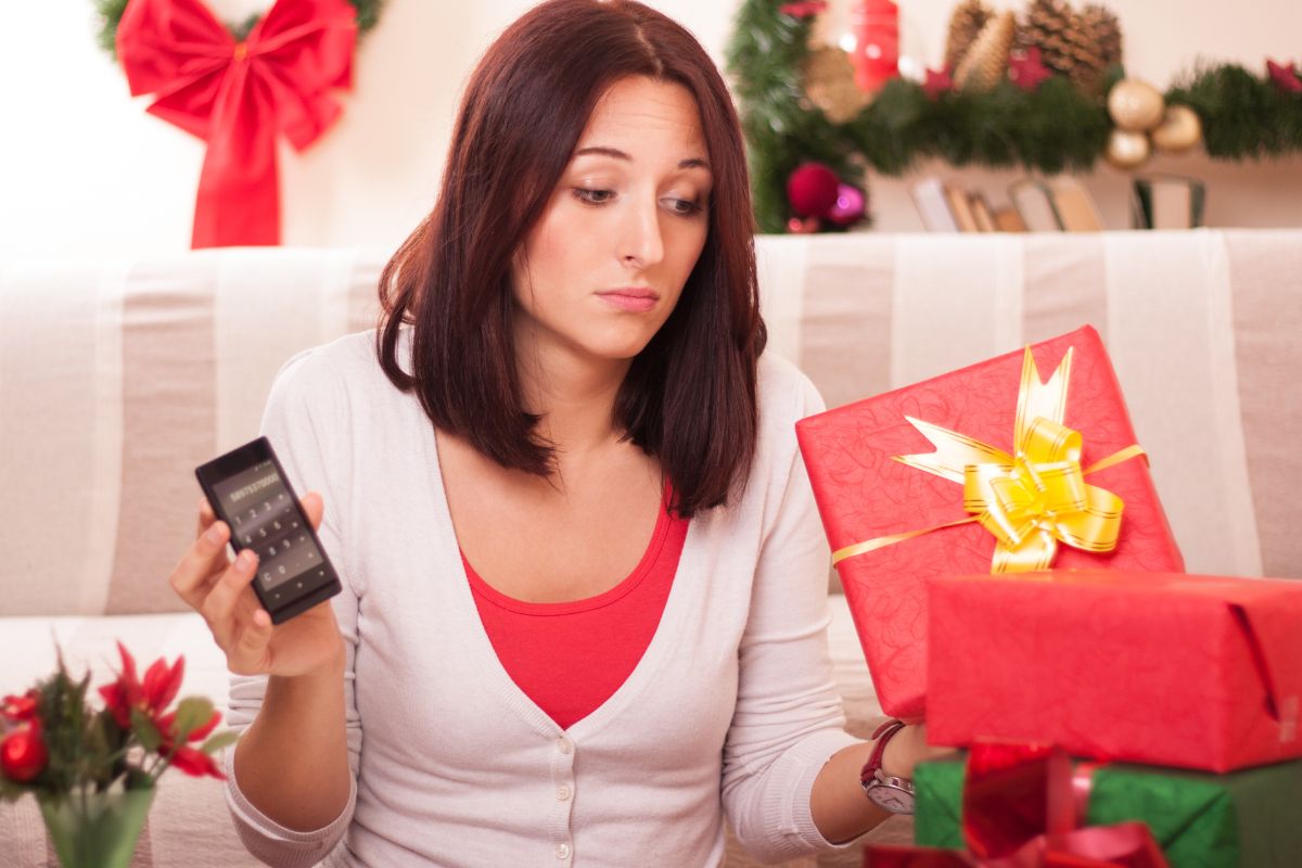 Photos of a woman calculating holiday expenses.