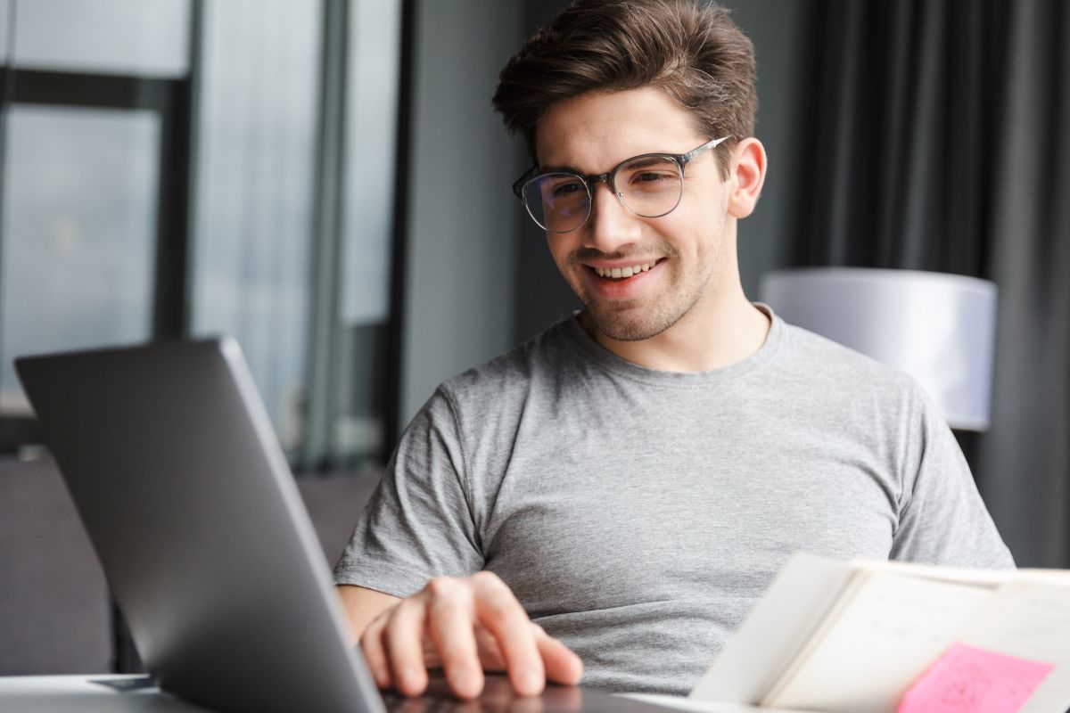 A man using a laptop.
