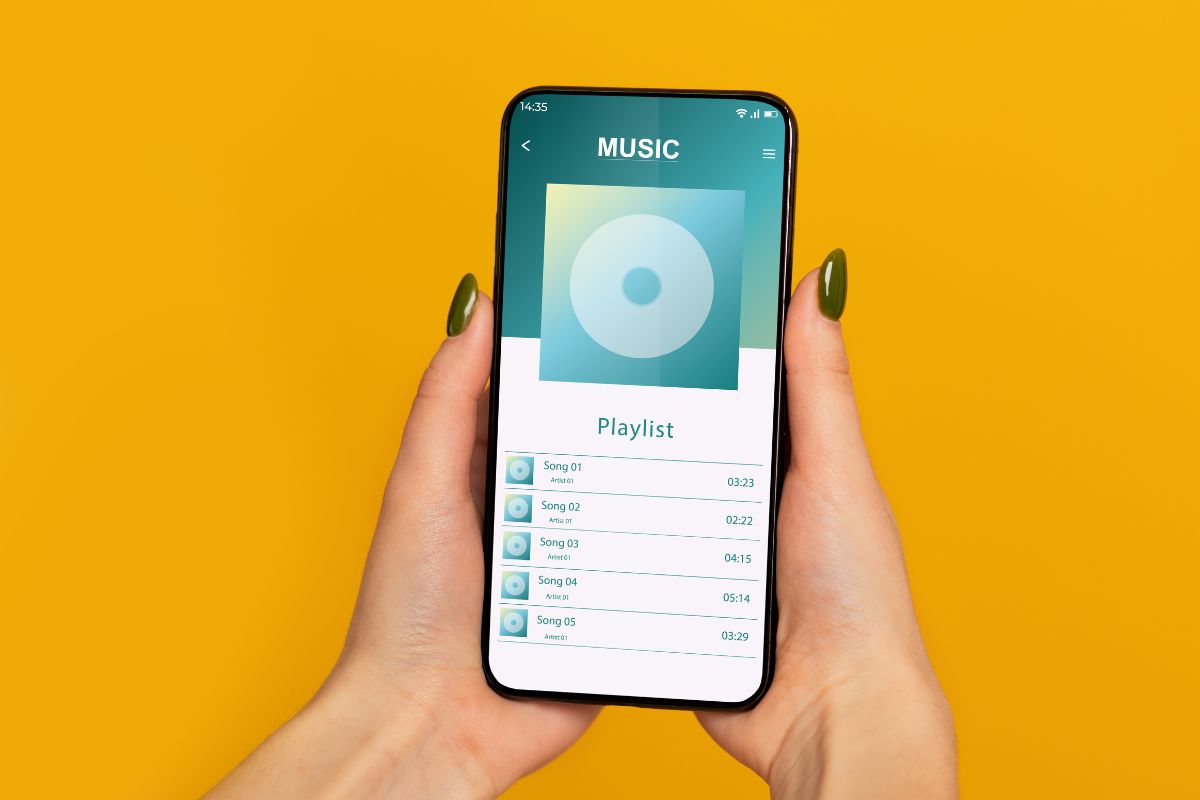 Image of a woman's hand creating playlists.