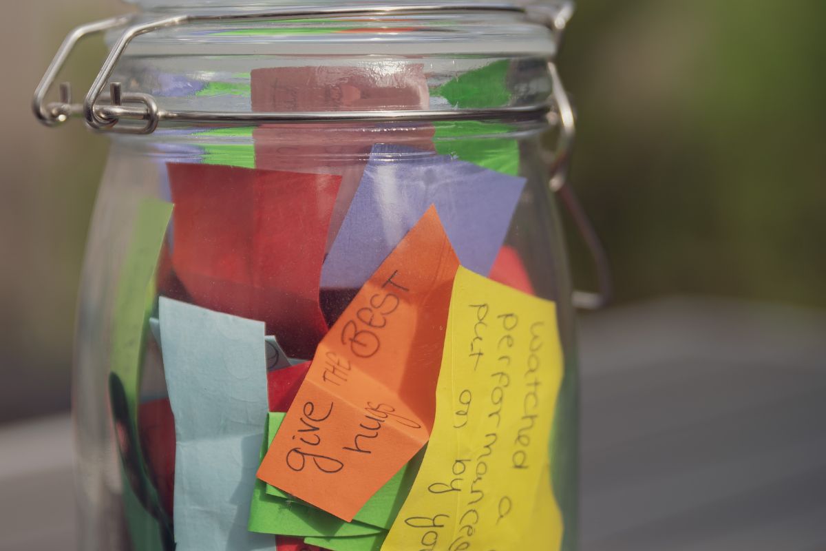 Photo of a jar filled with notes.