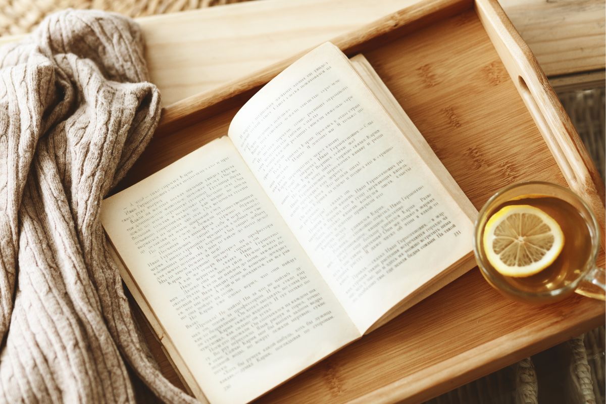 Image of a book and a drink.