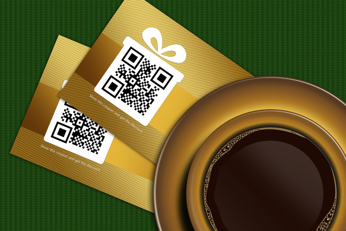 Picture of a coffee and coupons.