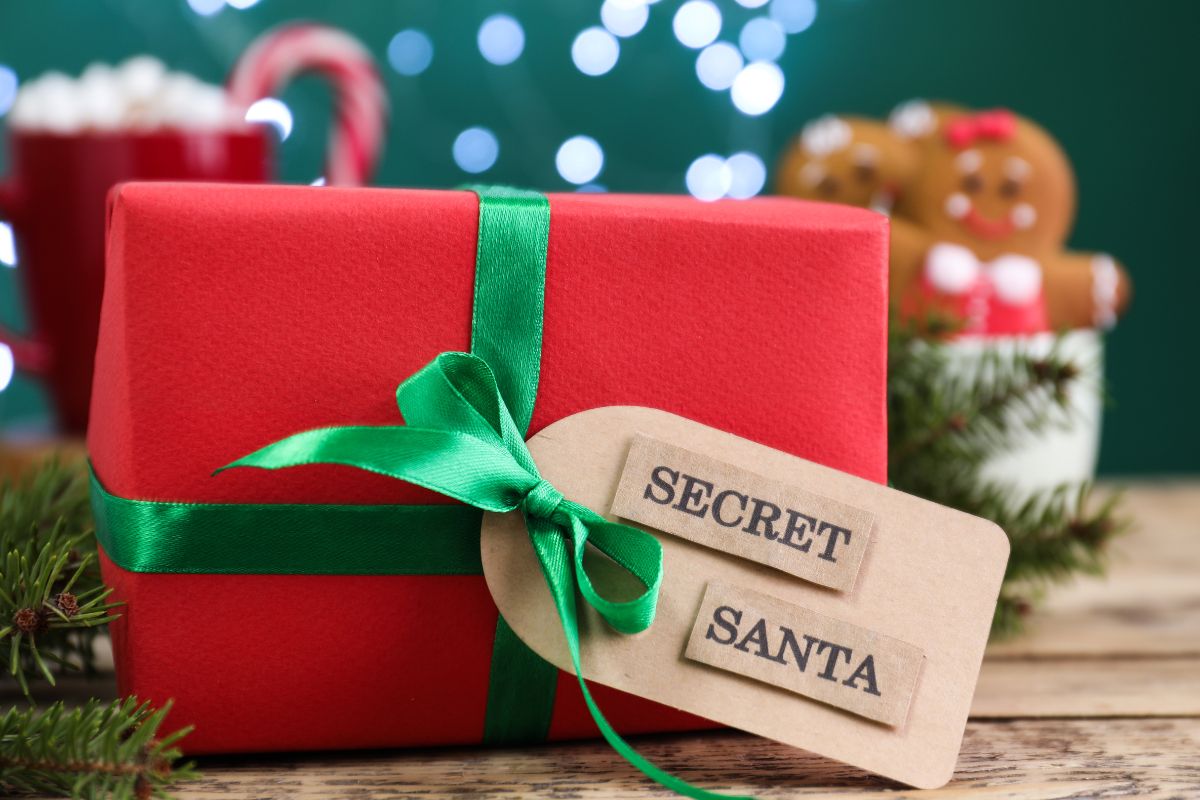 The photo shows a gift with a Secret Santa tag.