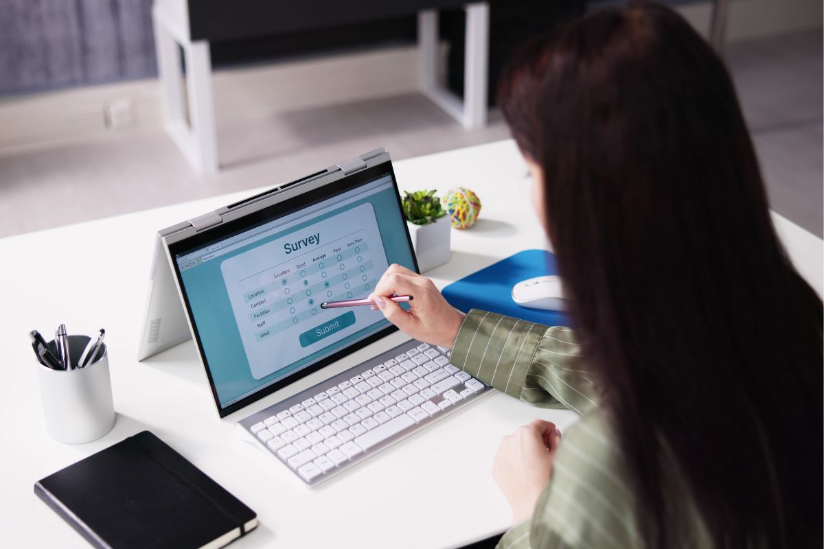 A young lady taking an online survey.