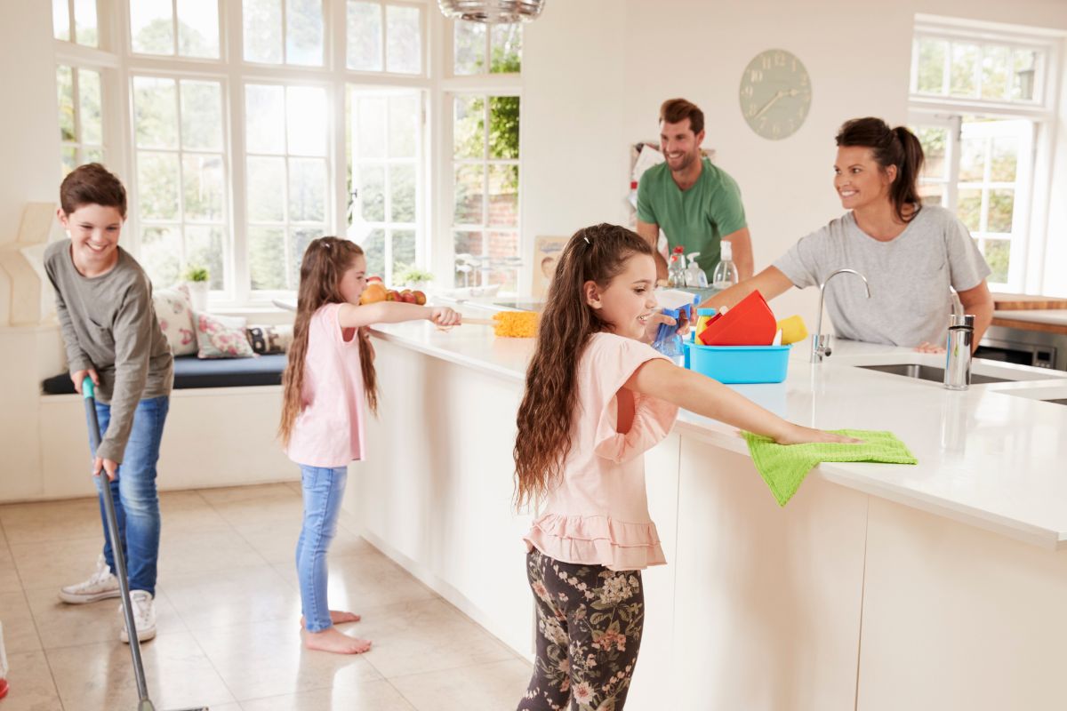 Group of the family doing household tasks.