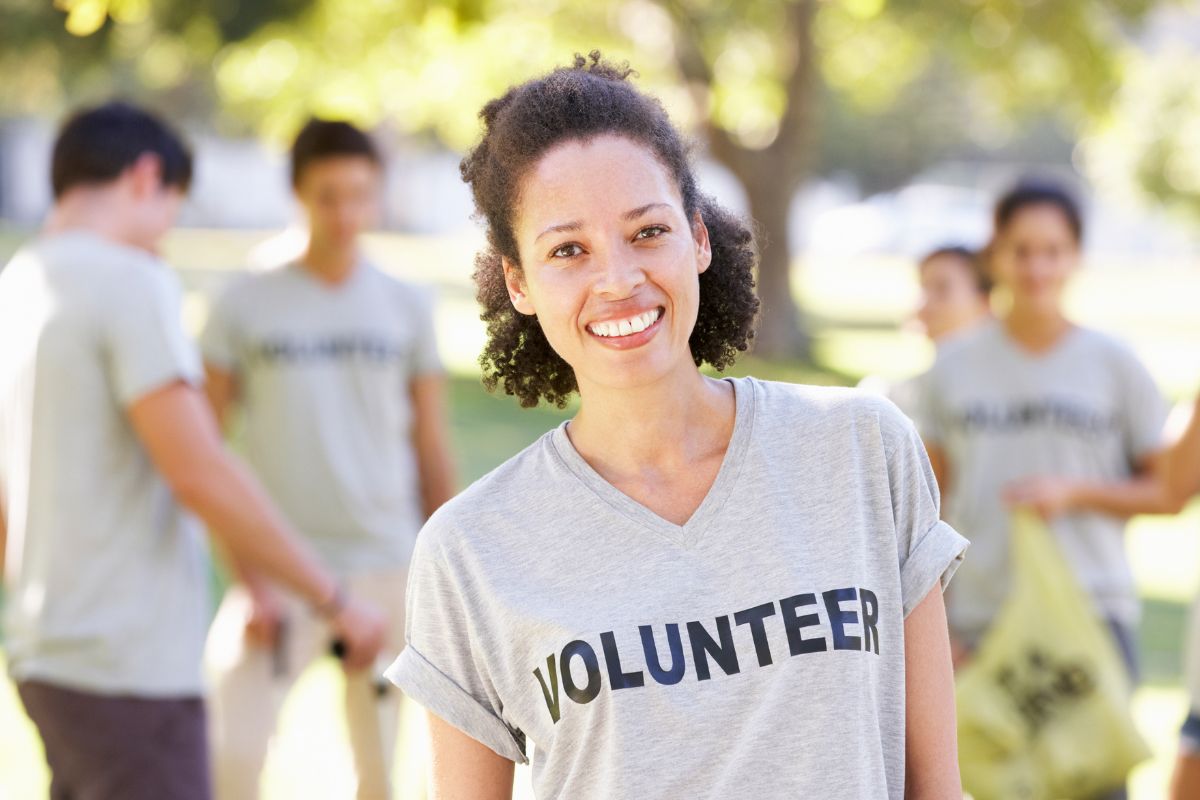 The picture shows a group of volunteers.