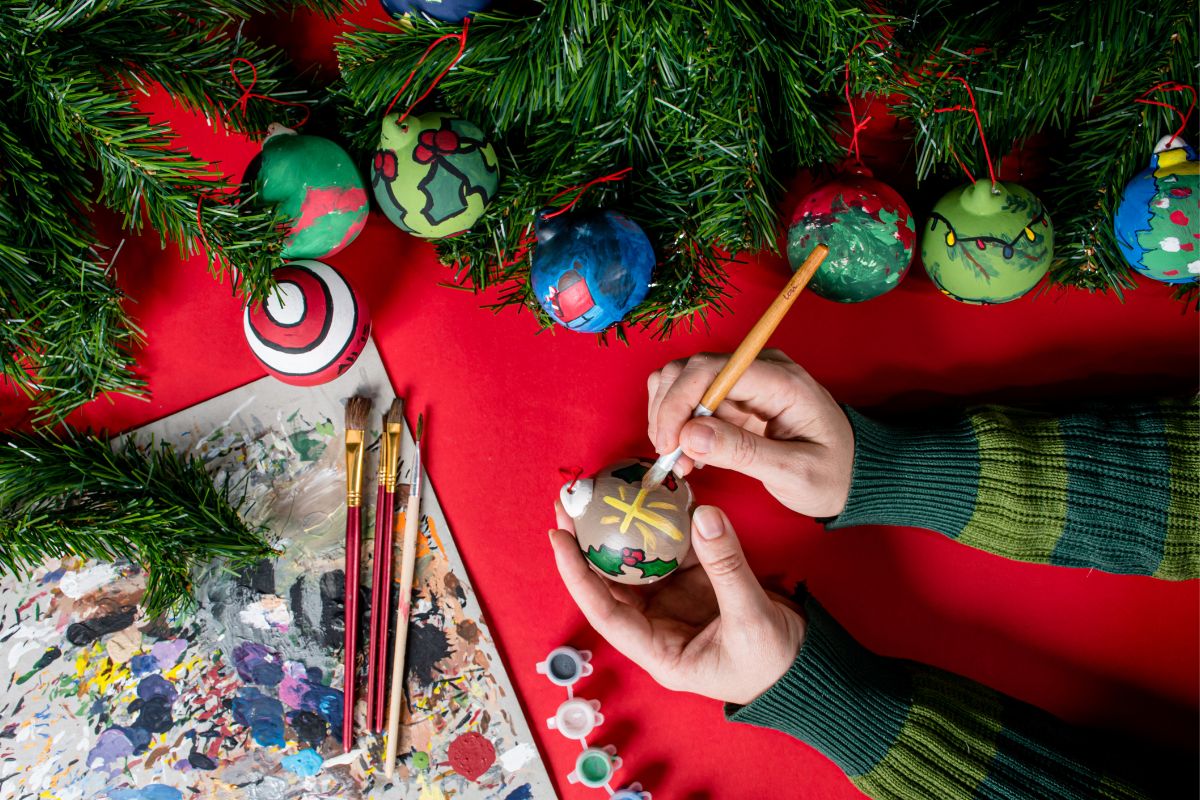 A woman making homemade ornaments.