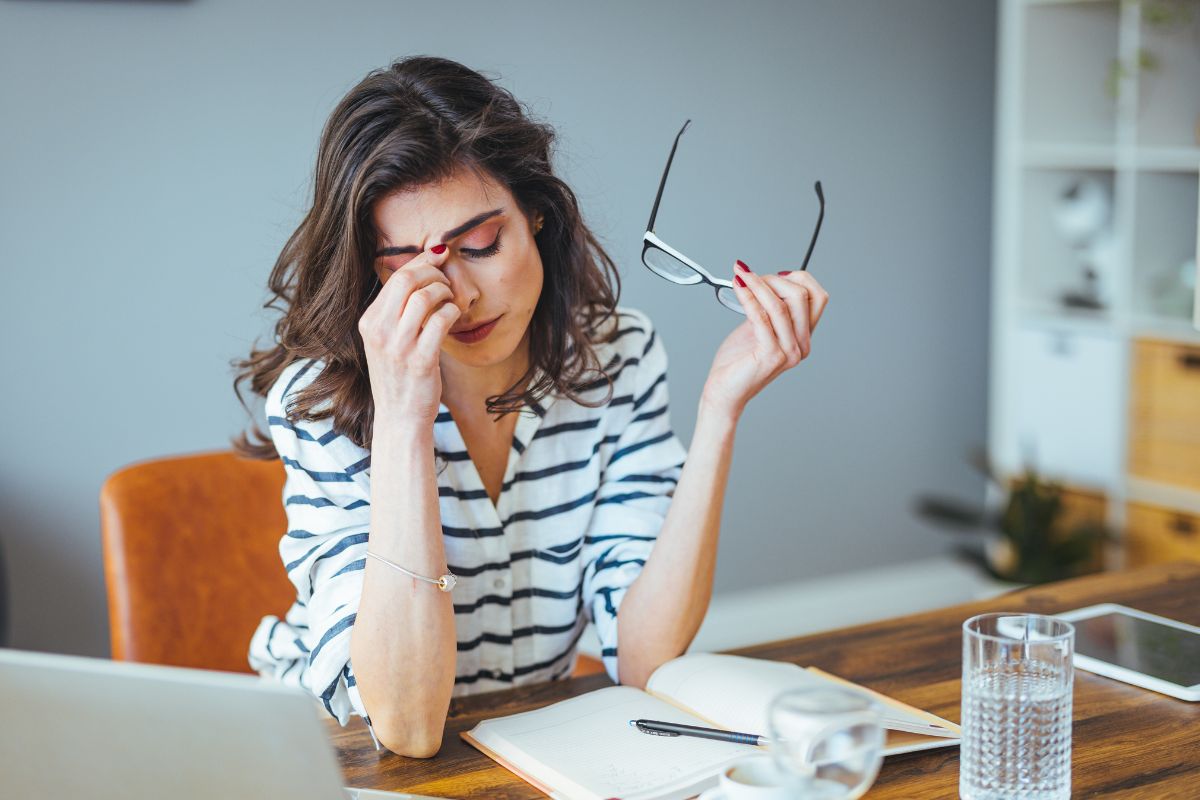 Image of a woman with financial struggles.