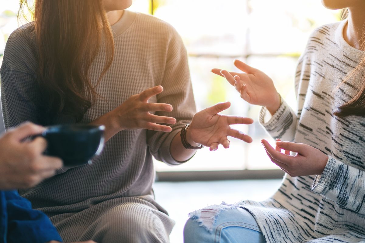 Image of women talking.