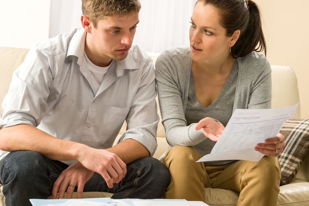 A couple talking about finances.