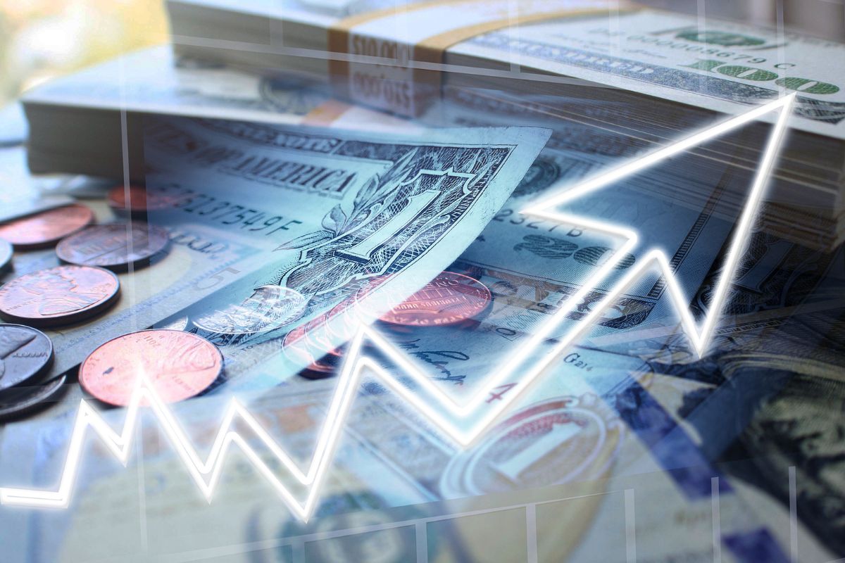 Picture of money and an arrow.