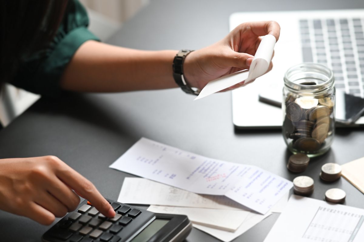 A woman tracking her expenses.