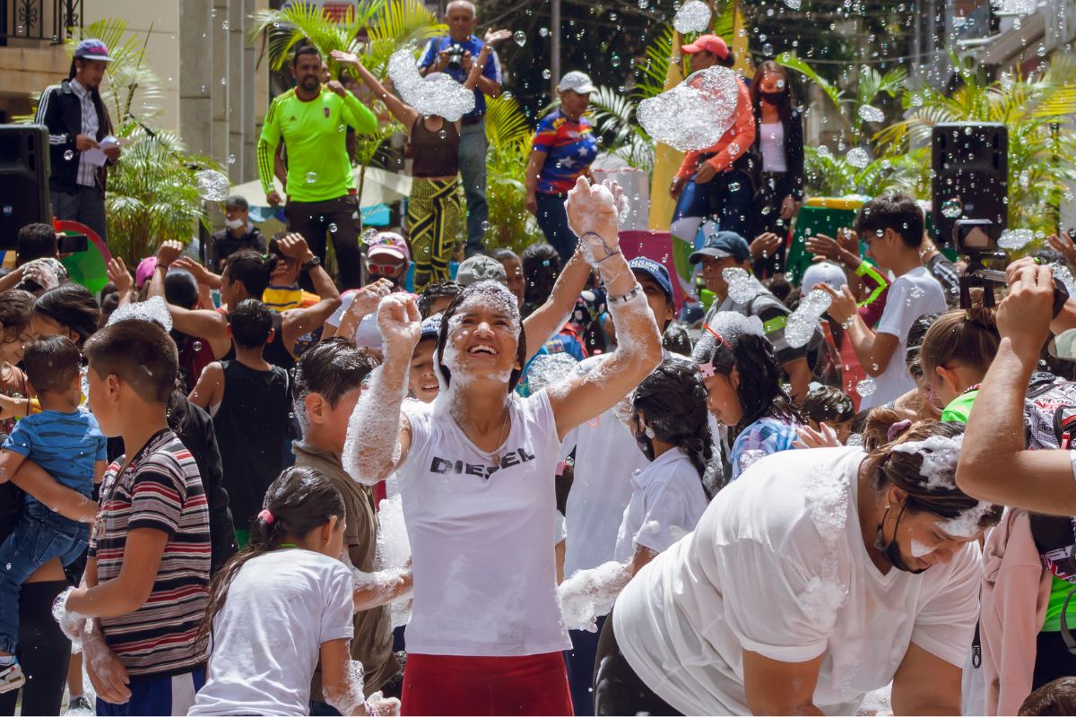 The photo shows a group of people at the event.