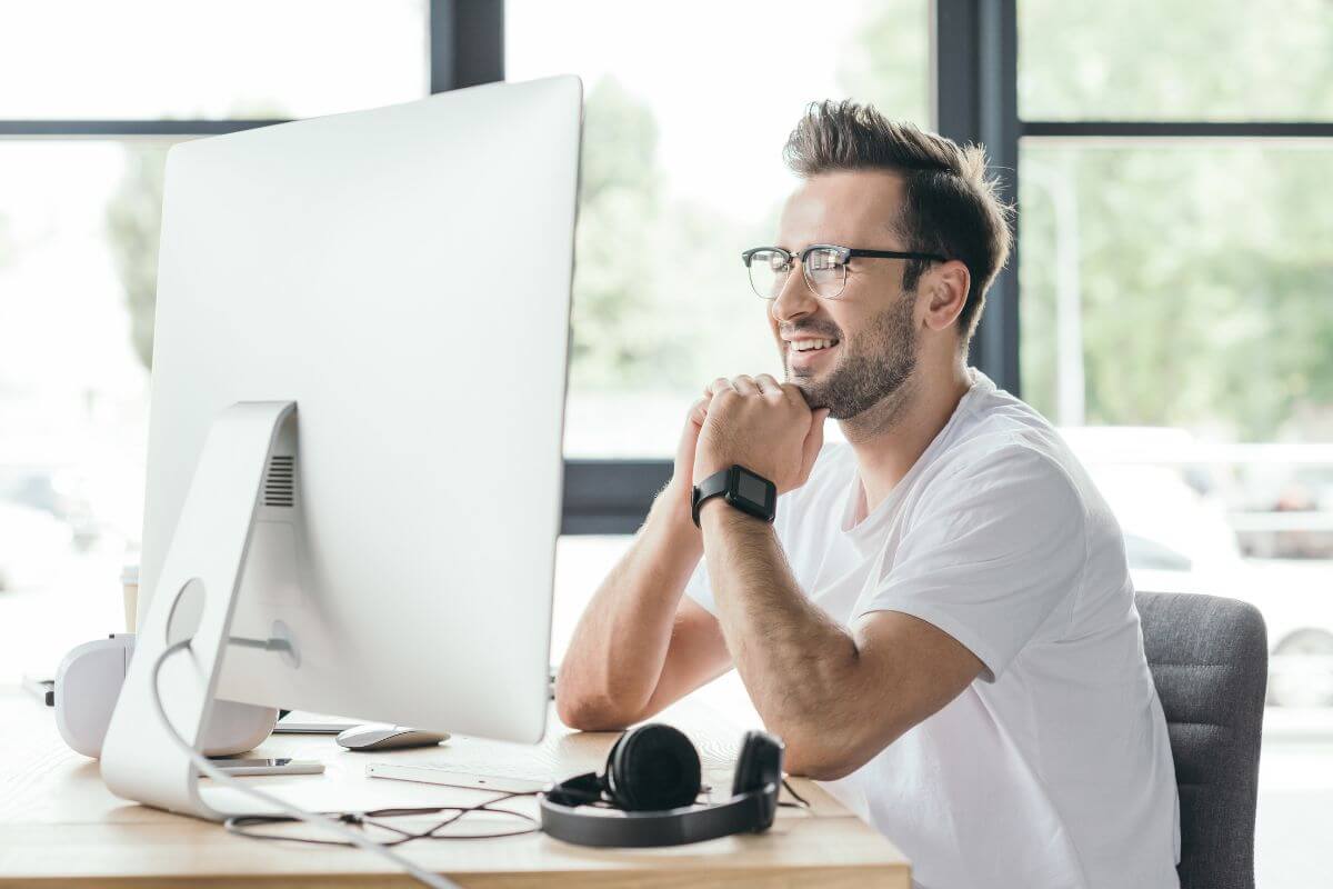 The photo of a headset and a man working on the computer indicated to launch of a service to organize digital files or photos and a unique side gig that solved a problem many struggle with while earning an income.