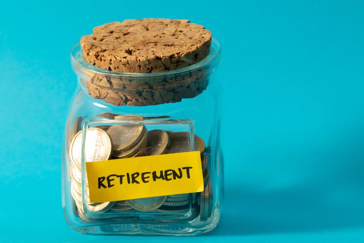 The photo of a jar filled with coins and with a note indicating to prioritize retirement over short-term spending to make room for savings that grow and support your future.