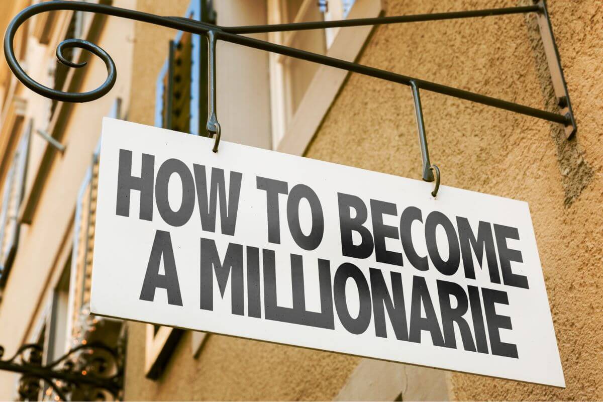 The photo shows street signage with notes which refers to starting now to become a millionaire with no money and growing wealth over time with patience and discipline.