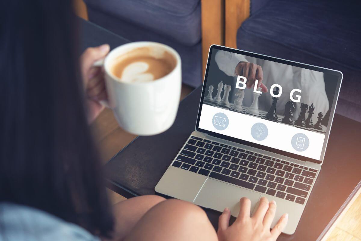 The images tells about a girl having a coffee while using a laptop referring to launch a blog and monetize through ads that can generate passive income for years.