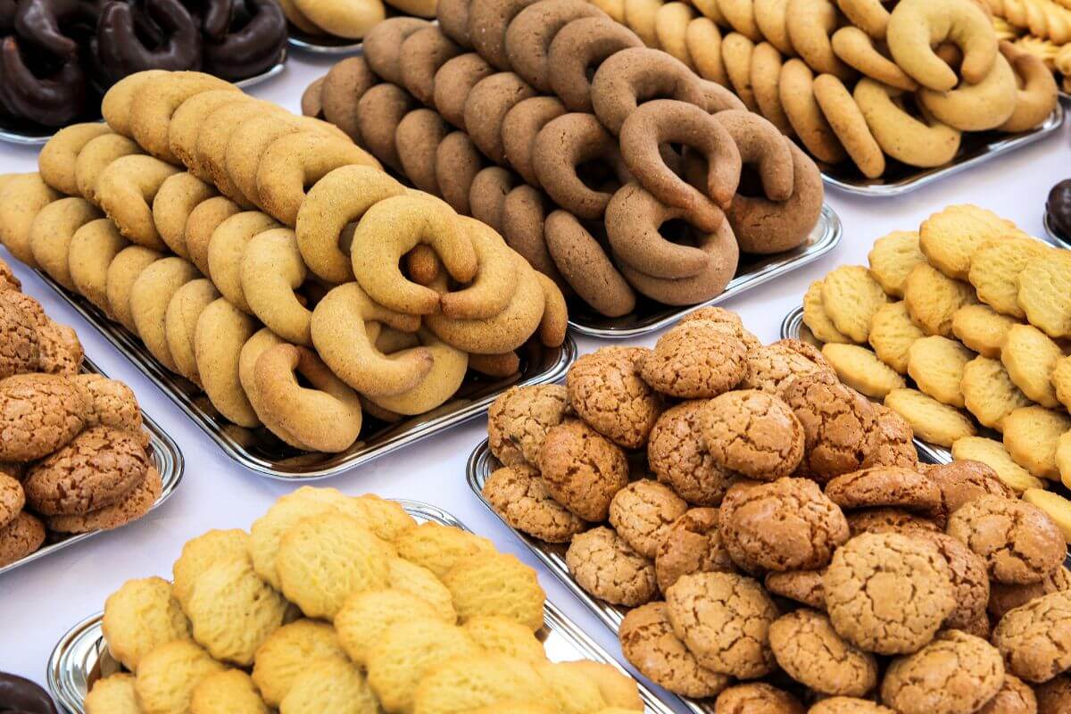 The photo of different varieties of baked goods on the table indicates selling baked goods at local events which is a fun way to share your cooking skills while earning money.