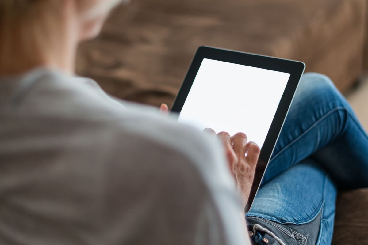 A woman using a tablet device.