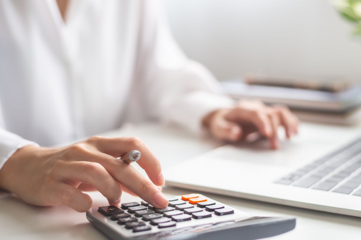 A woman's hand budgeting,.