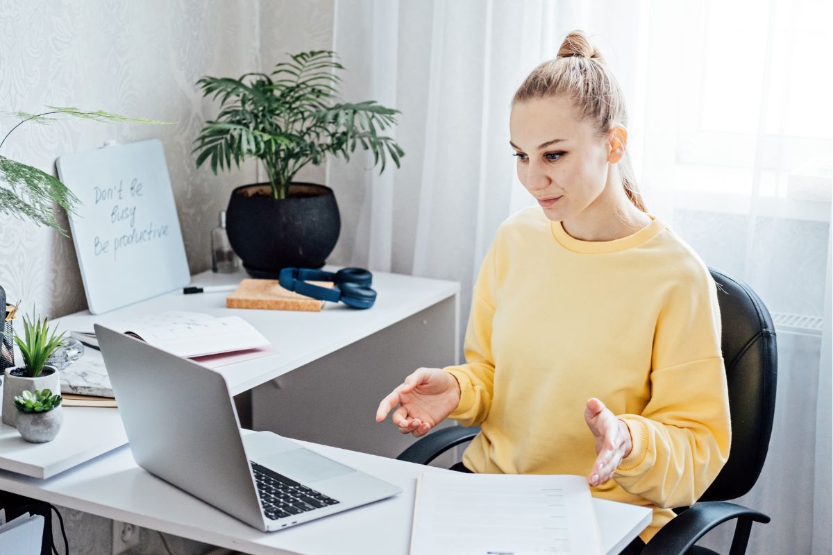 Picture of a woman working online.