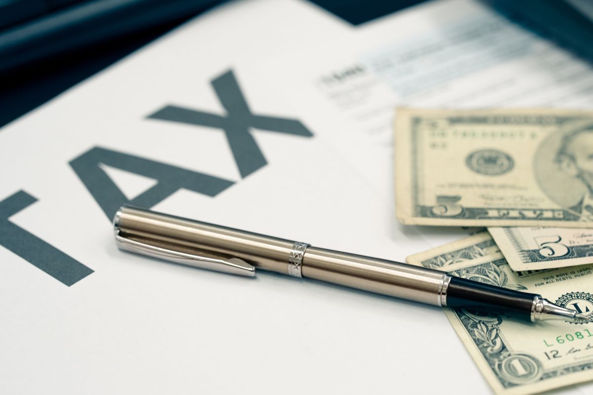Photo of money and a tax paper.