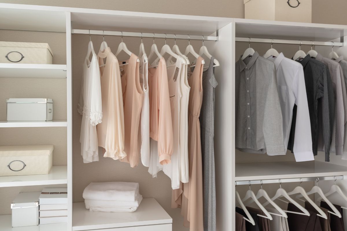 Picture of a wardrobe with clothes.