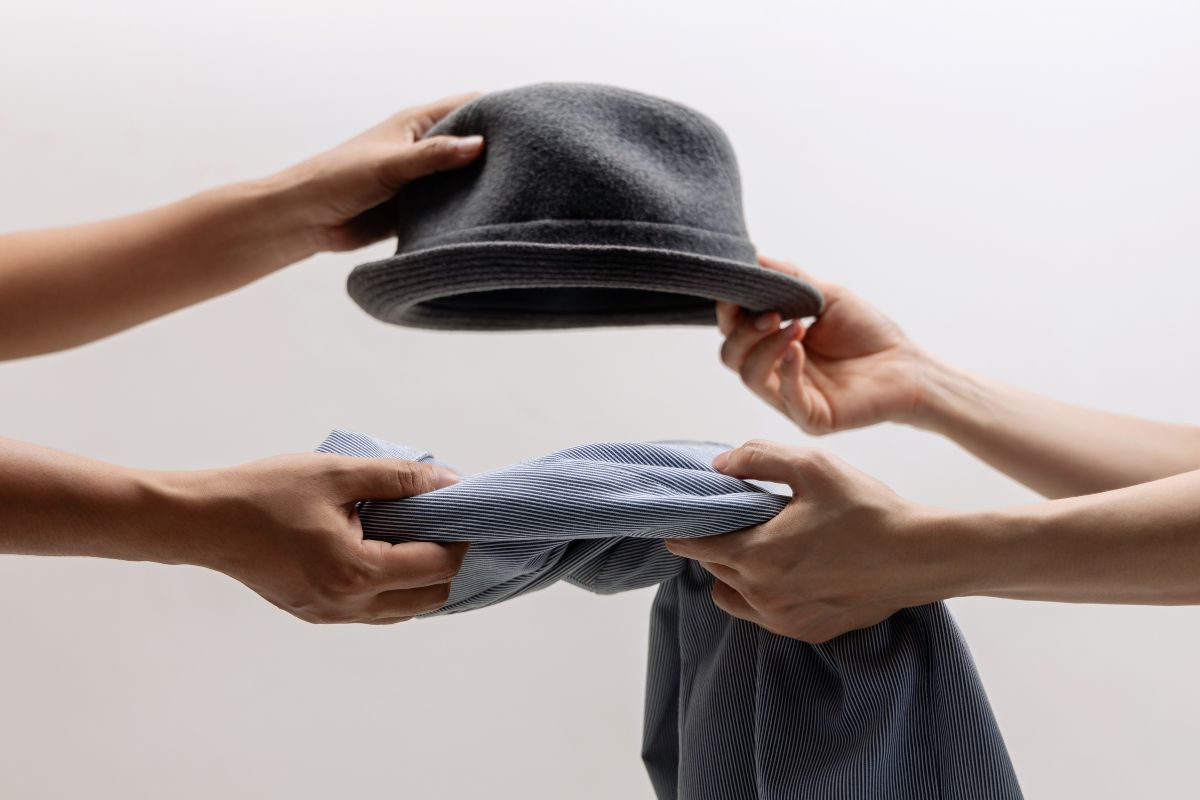 Image of women's hands and swapping stuff.