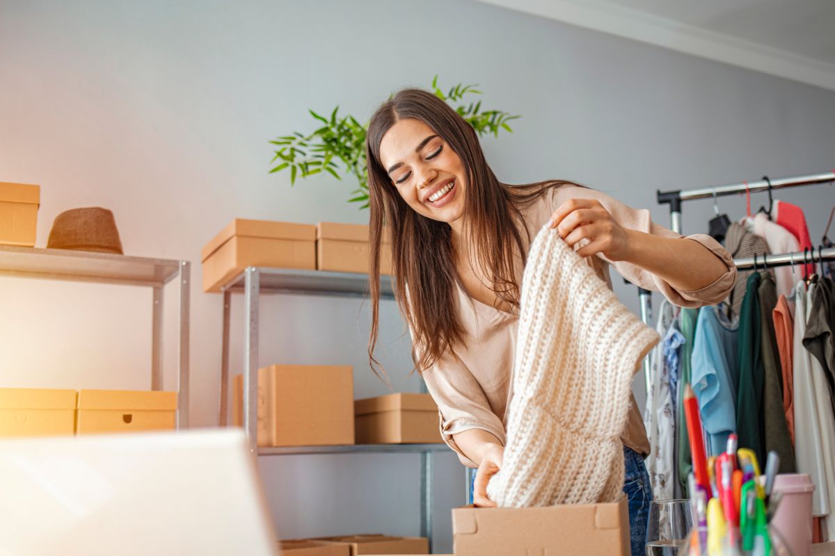 The image shows a woman flipping items online.
