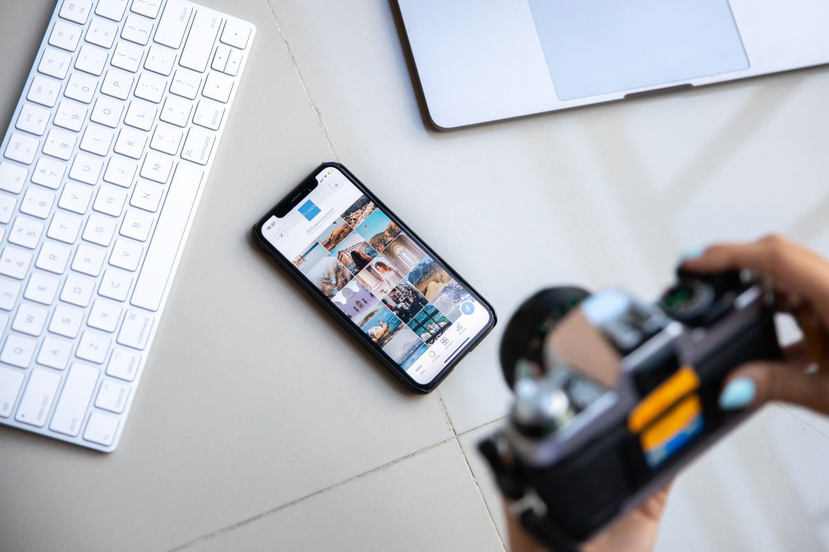 The photo shows a woman taking photos.